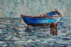 Traditiional fishing boat moored on Obidos Lagoon, Portugal